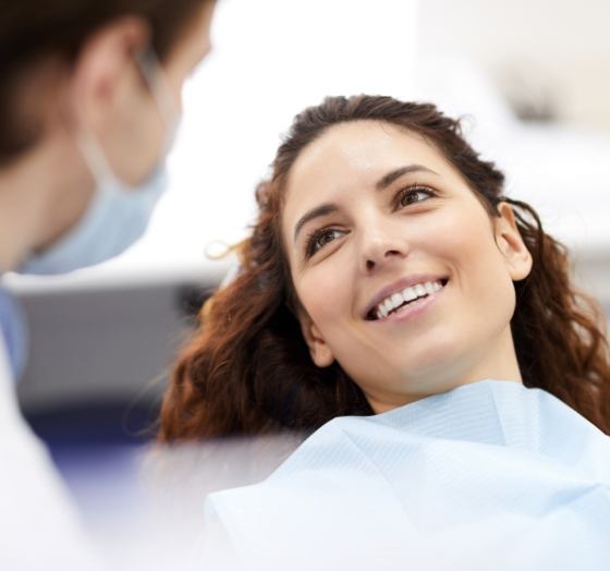 Woman smiling at her orthodontist