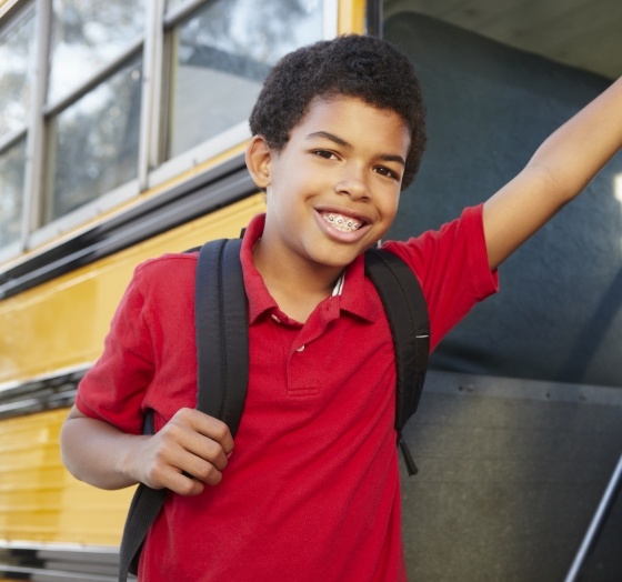 Smiling child going on a field trip