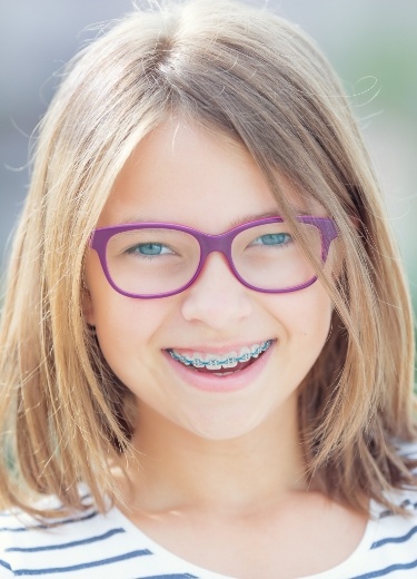 Smiling child with integrative orthodontics