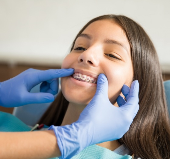 Patient receiving examination during integrative orthodontics treatment