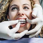 Tooth next to a first aid kit