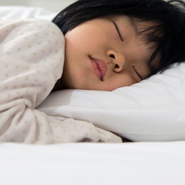 Child sleeping soundly thanks to sleep apnea treatment