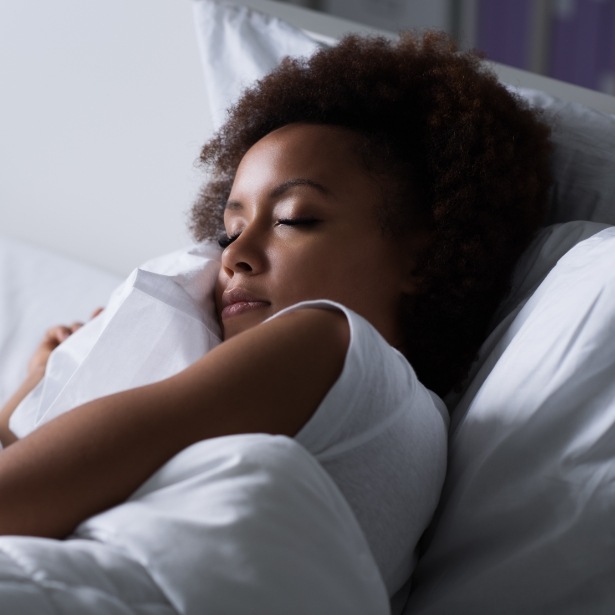 Woman sleeping soundly after airway orthodontics treatment